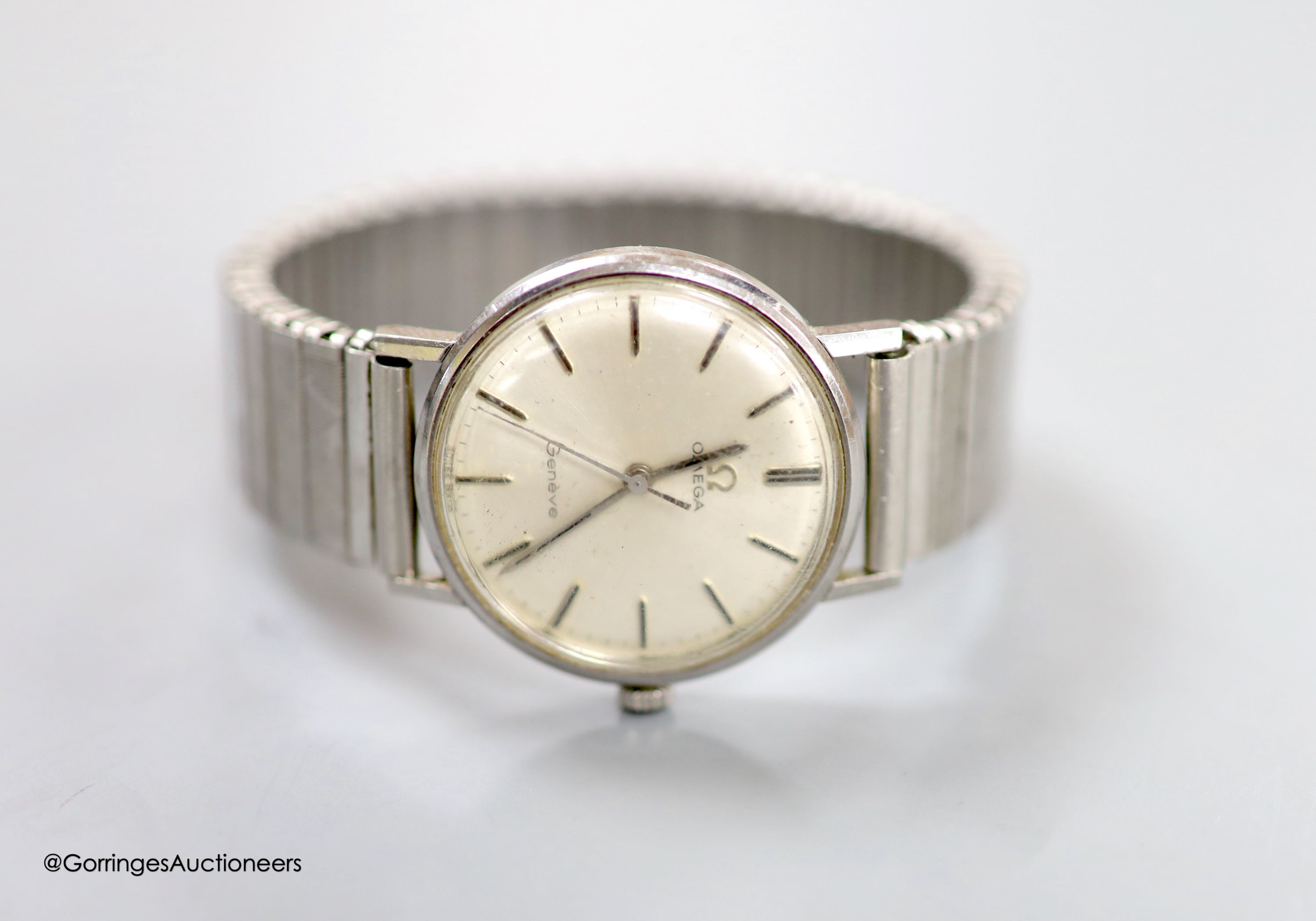 A gentleman's 1960's steel Omega manual wind wrist watch, on an associated flexible strap